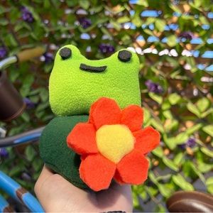 Frog with lovely flower